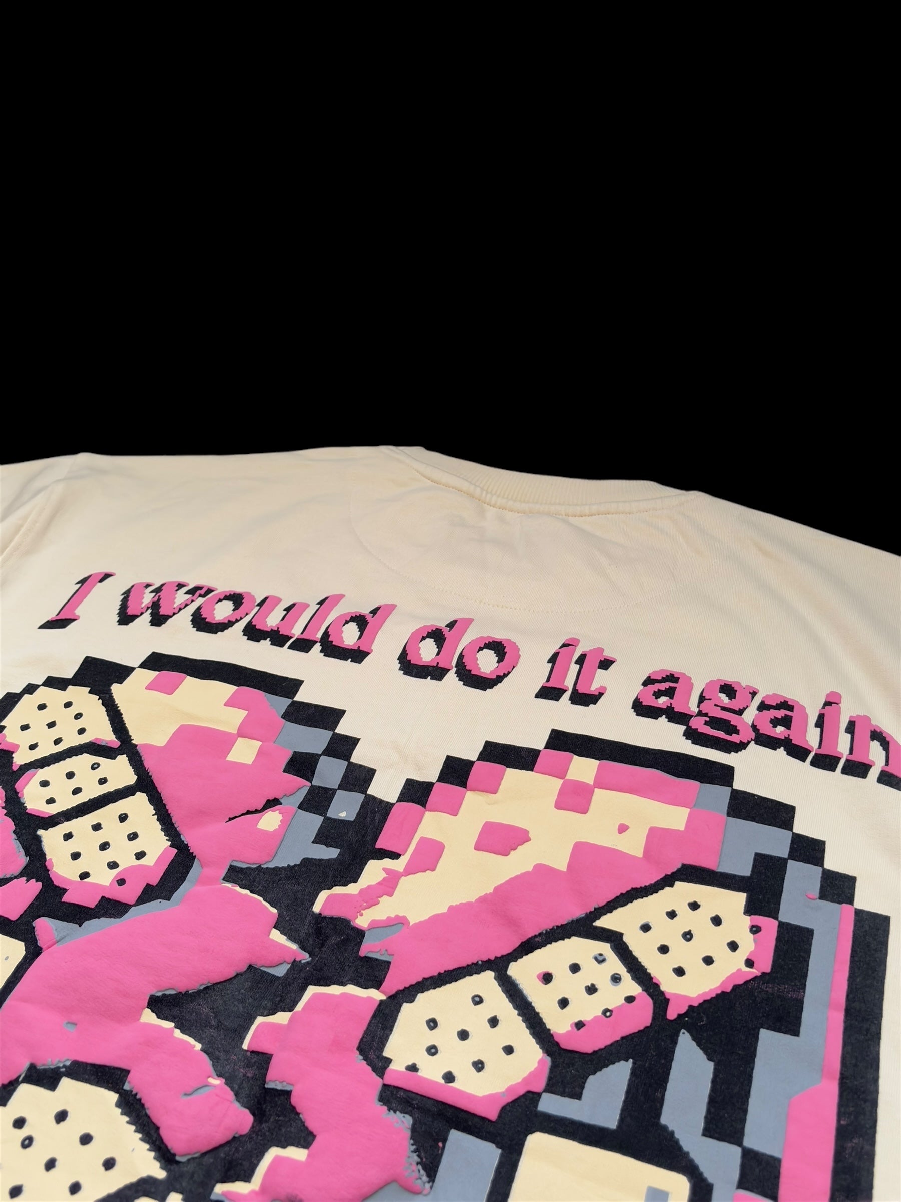 I would do it agaDetailed view of Imerno’s “I Would Do It Again” tee – embroidered retro pixel design and broken heart motif from a limited edition Indian streetwear drop.in - IMERNO